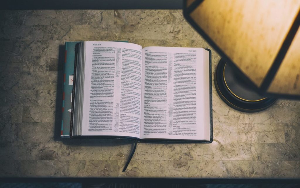 Bible under a light