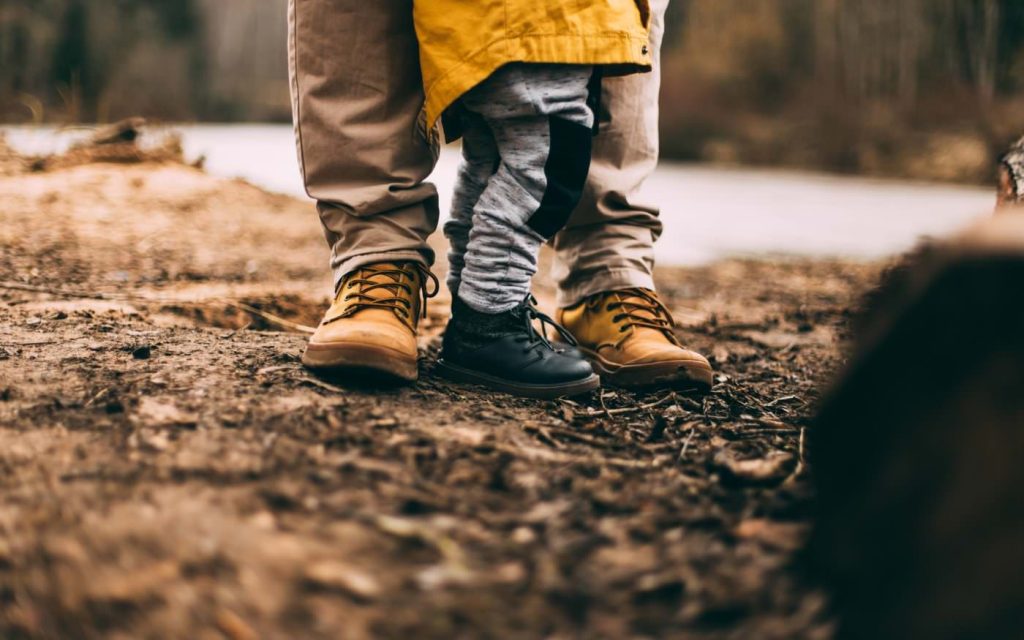 Feet of father and son