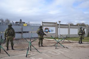 Russian soldiers blocking access to Ukrainian military base at Perevalne during the 2014 Crimean crisis